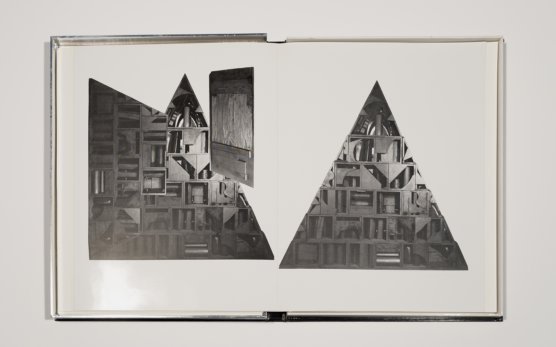 A black and white screenprint on paper consisting of triangular and geometric shapes.